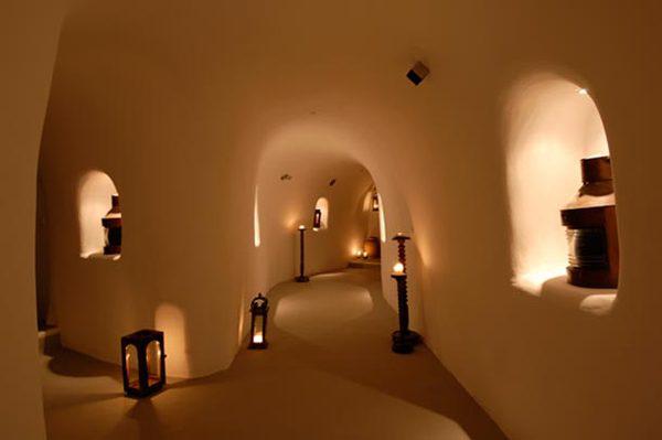 corridors carved into the rock and leading to wine cellar